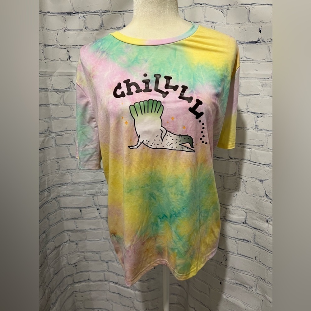 Shein “chillin” t shirt in a 4x but it’s more like a large
